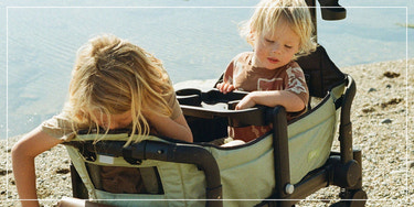 Children in a wagon stroller, baby travel gear