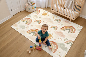Toddler stacking blocks on the Little Rainbows Pattern kids rug in a bright bedroom