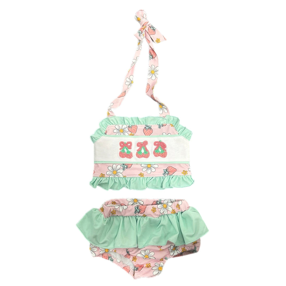 Two-piece strawberry swimsuit for babies, perfect for summer fun and playtime.