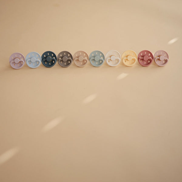 Mushie FRIGG Moon Natural Rubber Pacifier 2-Pack Soft Colors
