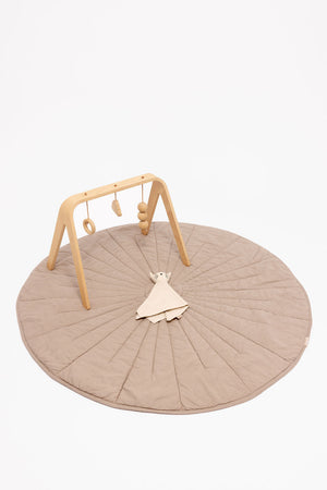 Desert Lark/Acadian linen quilted playmat for babies, soft and stylish for playtime.