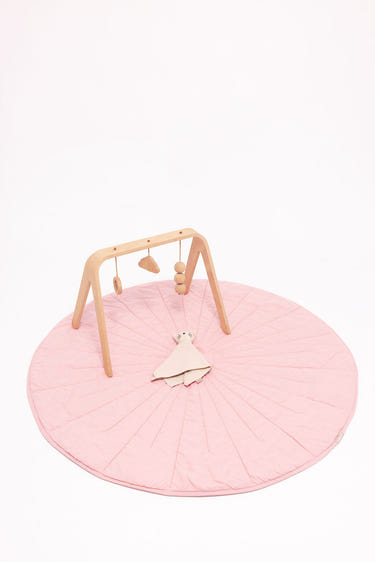 Linen quilted playmat featuring Galah and Sparrow designs, perfect for baby playtime and comfort.