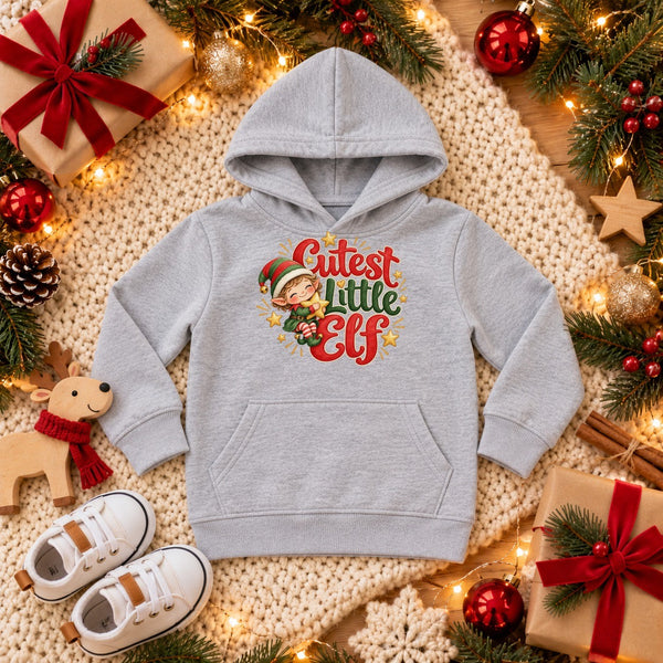 Cutest Little Elf toddler hoodie in heather grey, Christmas flat lay