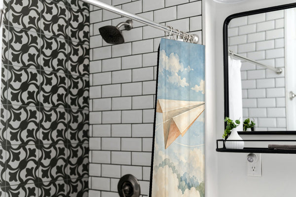 Paper Planes shower curtain in a modern farmhouse bathroom with subway tile