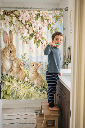 Child brushing teeth in a family bathroom with the Apple Blossom Family Bunny shower curtain