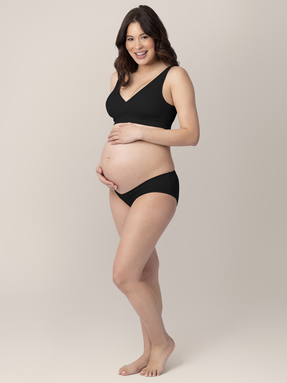 Under-the-bump bikini underwear pack in neutral colors, low rise style for comfort and support during pregnancy.