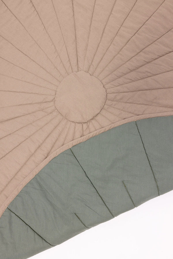 Desert Lark/Acadian linen quilted playmat at angle 2, perfect for baby playtime and comfort.