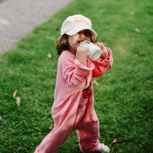 Silicone training cup with straw at angle 43, perfect for toddlers learning to drink independently.