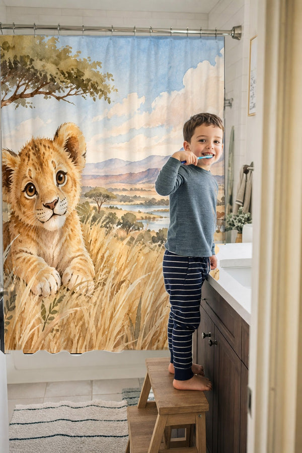 Child brushing teeth in a family bathroom with the Lion Cub Safari shower curtain