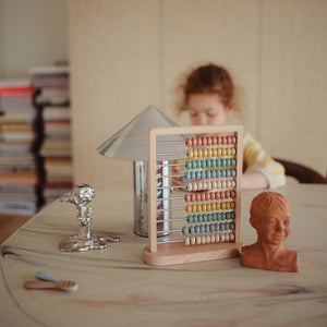 Colorful wooden abacus viewed from angle 3, perfect for early childhood learning and development.