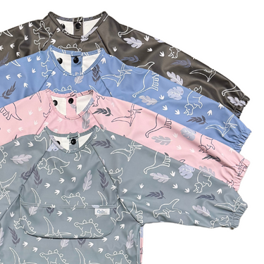 Grayson Long Sleeve Bib featuring a fun dinosaur design for mess-free mealtime. Perfect for babies and toddlers.