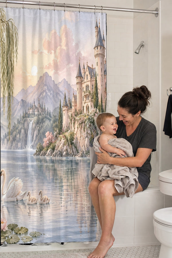 Mom holding her baby on the tub edge next to the Lakeside Castle Fairy Tale shower curtain