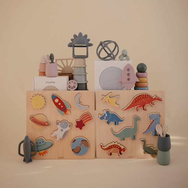 Colorful wooden dino puzzle at angle 7, perfect for toddlers' learning and playtime.