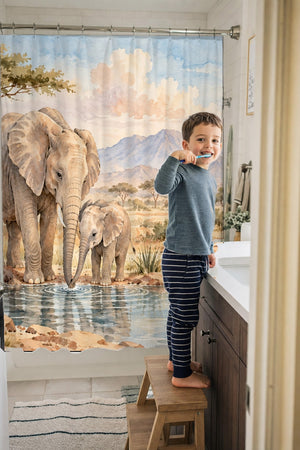 Child brushing teeth in a family bathroom with the Elephant Family Safari shower curtain