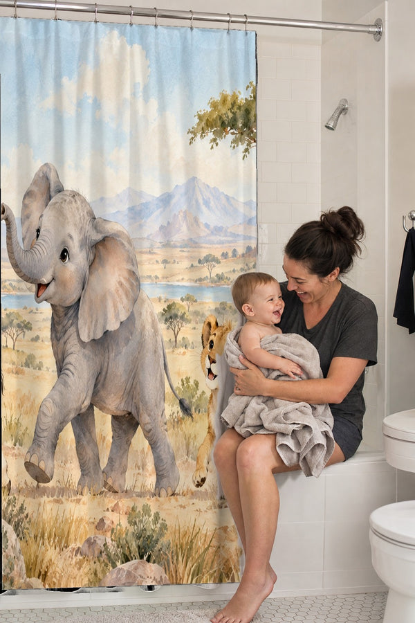 Mom holding her baby on the tub edge next to the Safari Parade shower curtain
