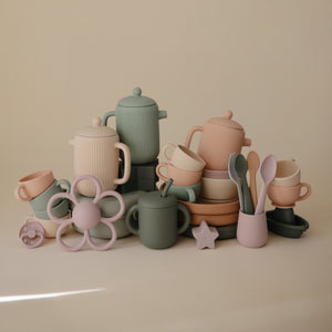 Colorful silicone tea play set for babies, perfect bath toy for imaginative water play. Angle 16 view.