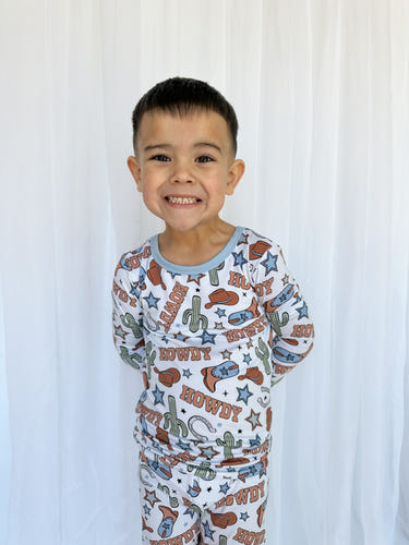 Howdy Partner Set sleepsuit for babies, featuring a cozy design perfect for sleep and play.