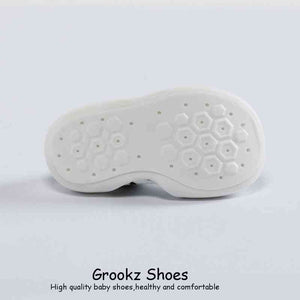 White leopard baby sock shoes, angle 4 view, perfect for stylish and comfortable infant footwear.
