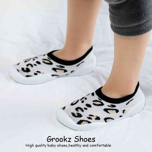White leopard baby sock shoes at angle 8, perfect for stylish comfort in shoes and booties for infants.