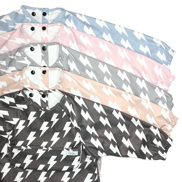 Grayson Long Sleeve Bib with Lightning Bolts design for mess-free mealtime fun for babies.