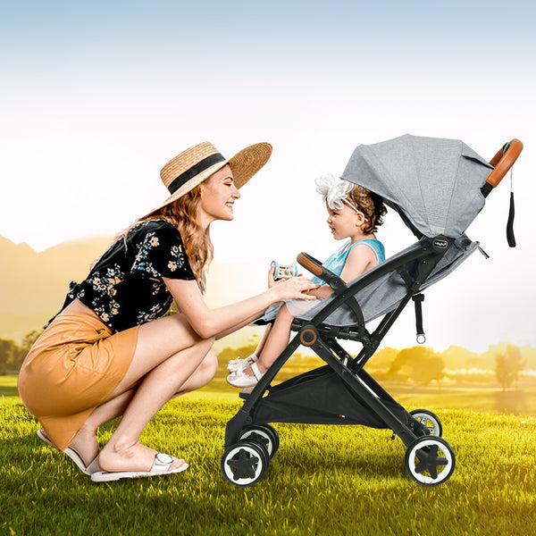 Lightweight aluminium frame baby stroller with net, angled view showcasing design and functionality.