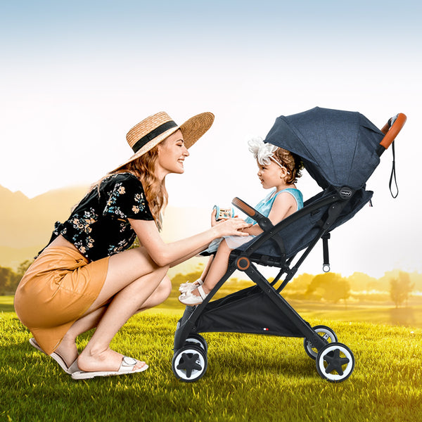 Lightweight aluminium frame baby stroller with net, angled view showcasing design and features.