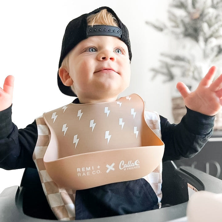 RRCO x C&F Bolt Catch All Silicone Bib for babies, featuring a fun design and easy-clean material.