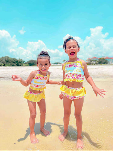 Mamas girl floral two-piece swimsuit for babies, perfect for summer fun and playtime at the beach or pool.