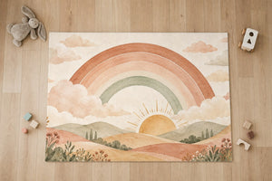 Top view of the Rainbow Sunrise Hills kids area rug on a wood floor