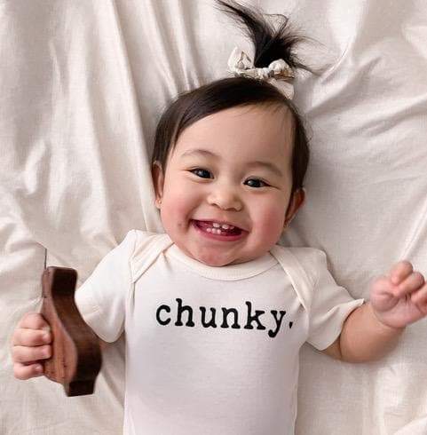 Chunky graphic bodysuit for babies, perfect for stylish comfort in short sleeve design.