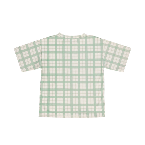 Oversized T-Shirt in organic cotton jersey, fern plaid design, angle view showcasing soft fabric and playful style for babies.