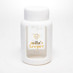 Set of 2 glass breast milk bottles at angle 14, perfect for safe breast milk storage.
