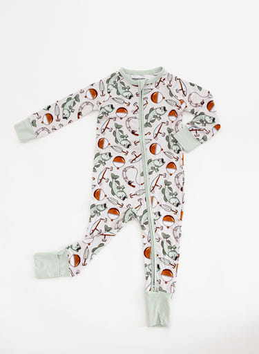 "Cast Away Zippy: Cozy zip pajamas for babies, featuring soft fabric and playful design for ultimate comfort."