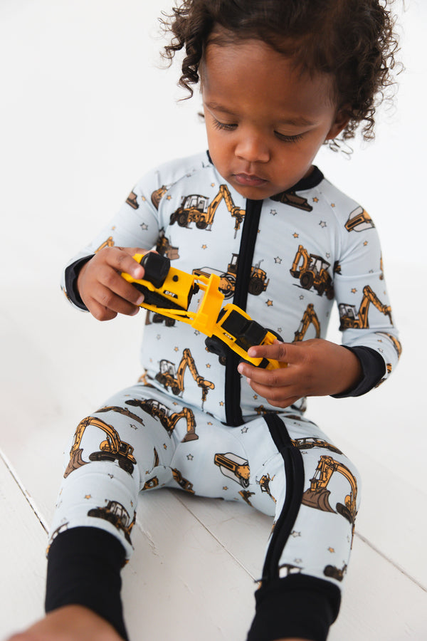 Dream Digger Zippy zip pajamas for babies in a cozy design, showcasing angle 6 view for style and comfort.