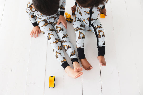 Dream Digger Set sleepsuit and pyjamas for babies, featuring a playful design, angle view 5.