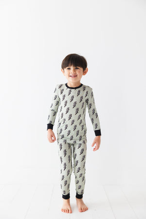 "Strike All Night Set for babies, cozy bedding and sleep essentials, angle view showcasing soft fabrics and design."