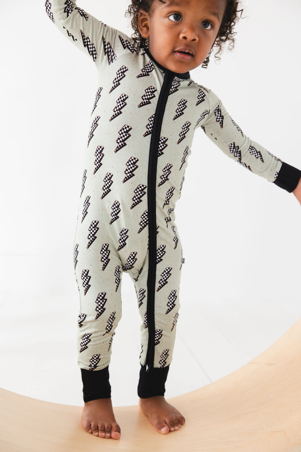 "Strike All Night Zippy: Cozy baby sleep sack for restful nights, featuring soft fabric and easy zip design."