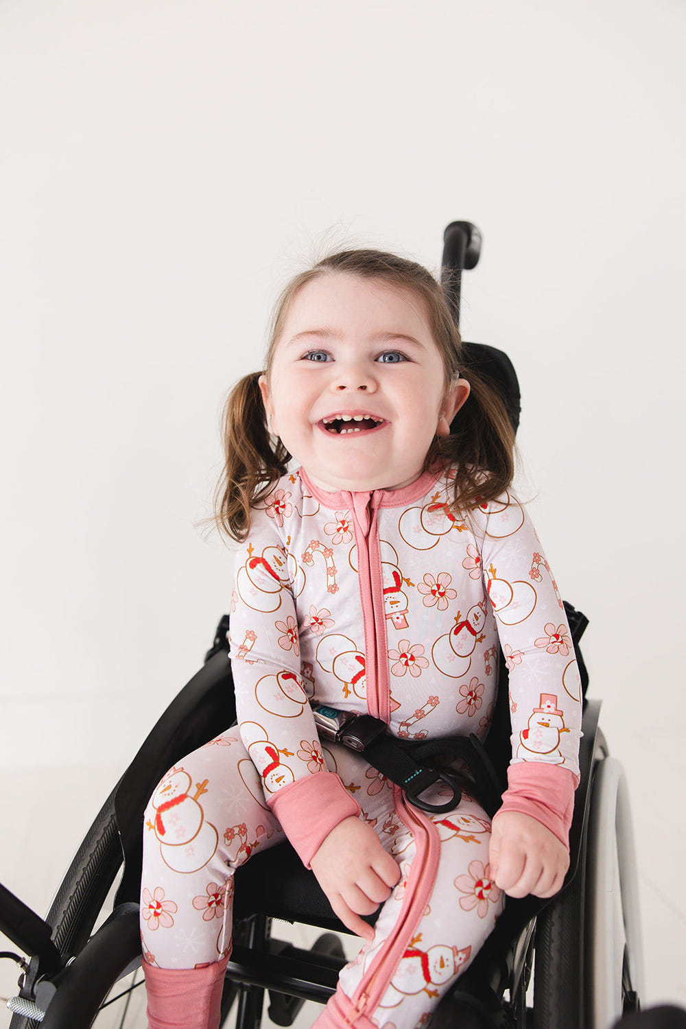 Cozy Snowman Zippy zip pajamas for babies, featuring a festive snowman design and soft fabric for comfort.