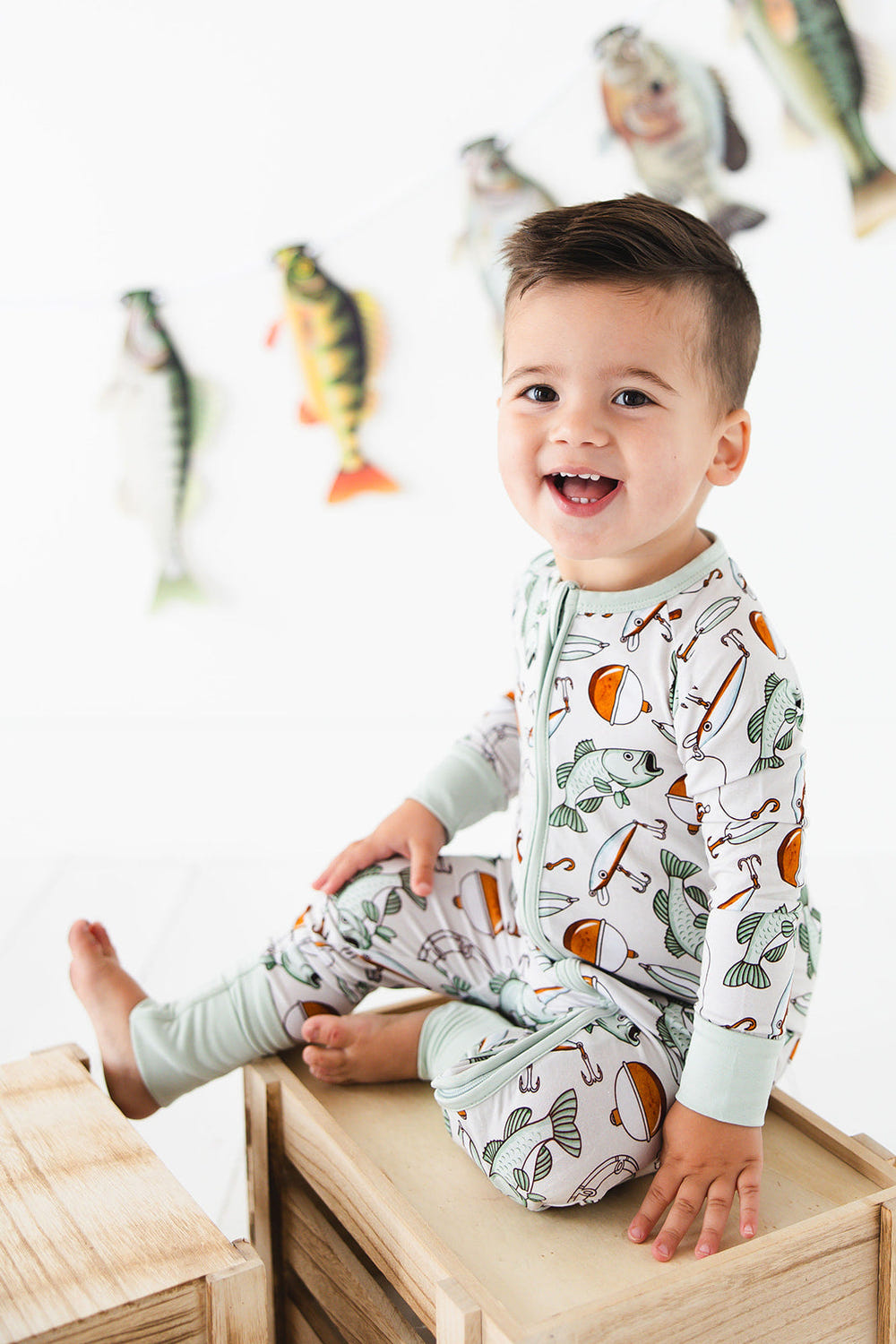 "Cast Away Zippy: Cozy zip pajamas for babies, featuring soft fabric and playful design for ultimate comfort."