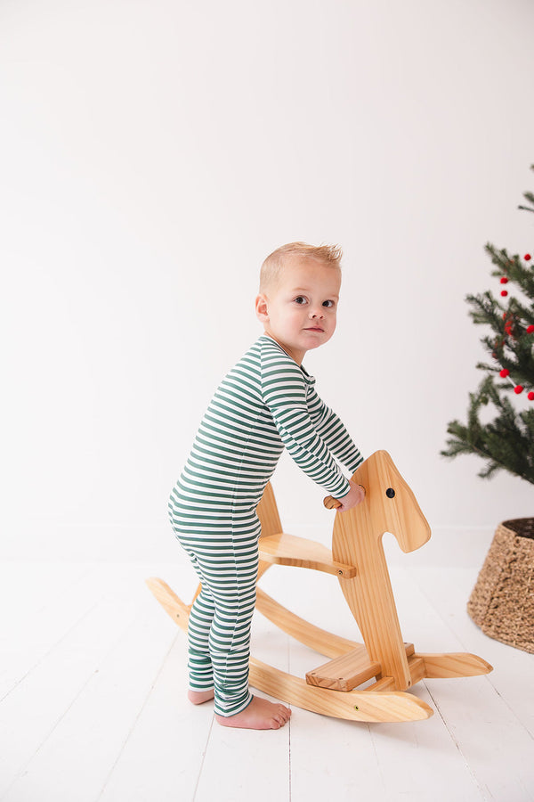 Green Stripes Zippy zip pajamas for babies, featuring a cozy design and soft fabric, displayed at an angle.