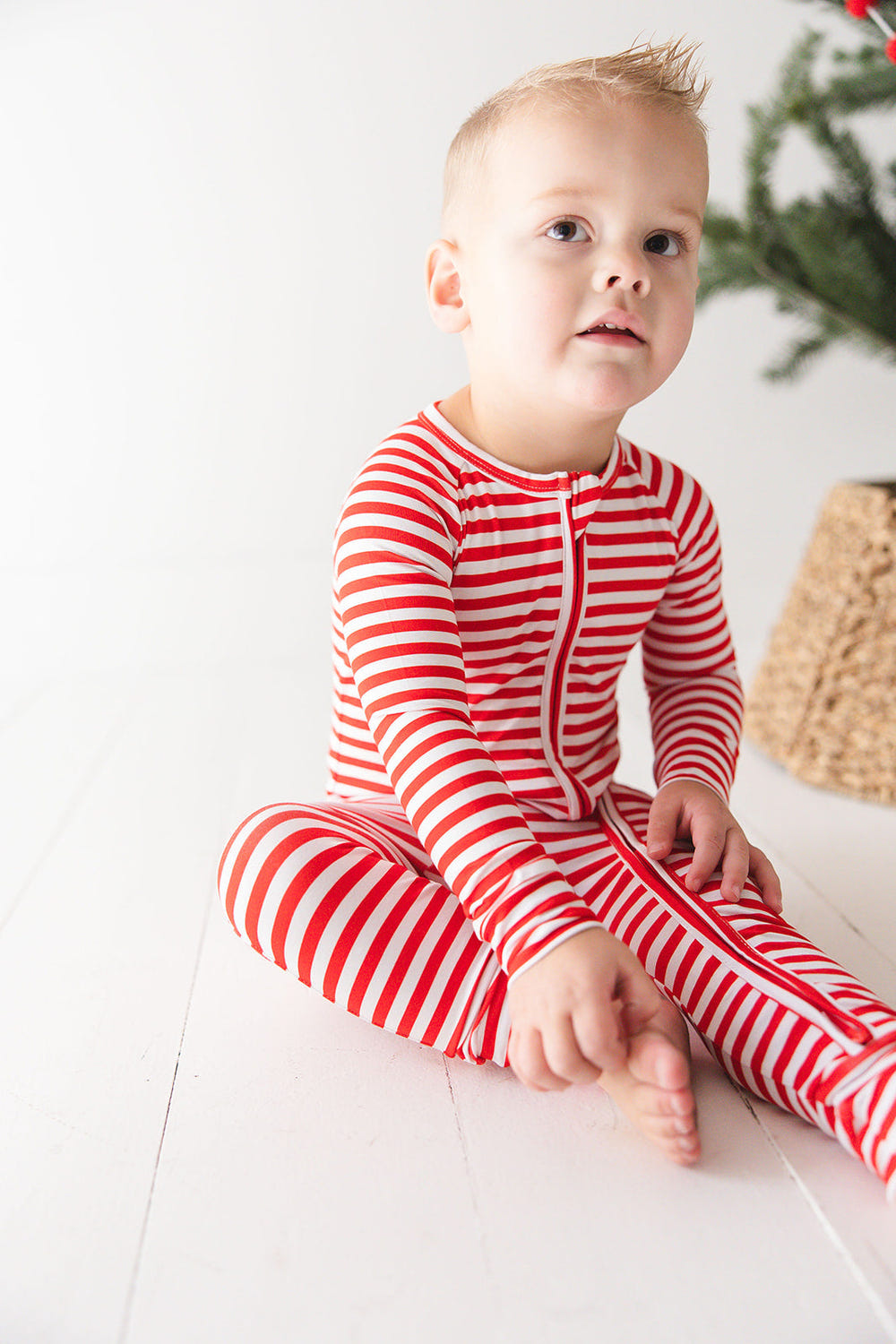 Red Stripes Zippy zip pajamas for babies, featuring a stylish design and comfortable fit for all-night sleep.