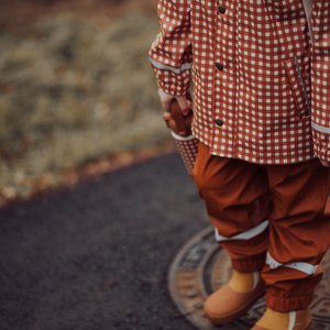 Sienna rain pants for babies, stylish and waterproof, shown at angle 12. Perfect for outdoor adventures!