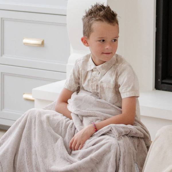 LUSH TODDLER BLANKETS in soft fabric, perfect for cozying up your little one. Angle 4 view showcasing vibrant design.