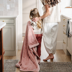 Lush toddler blankets in soft colors, perfect for cozy naps and snuggles. Ideal for blankets and swaddles.