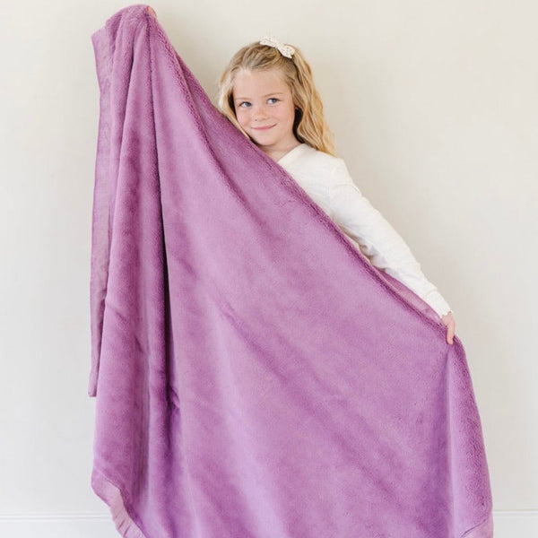 Lush toddler blankets in soft fabric, perfect for cozying up and swaddling your little one.