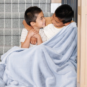 Lush toddler blankets in soft fabric, perfect for cozying up and swaddling little ones. Angle 14 view.