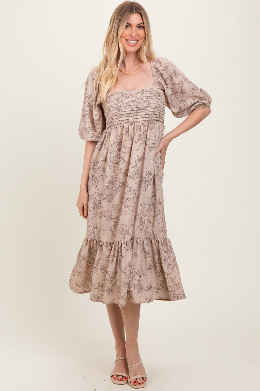 Beige floral pleated bodice midi dress for babies, perfect for special occasions and everyday wear.