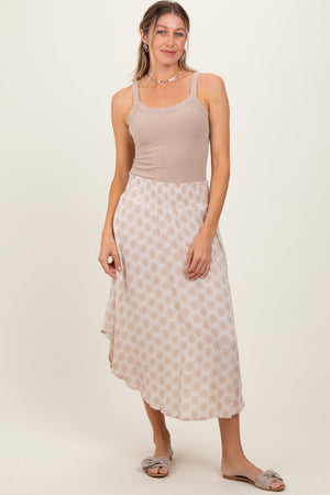 Beige damask print maternity midi skirt with smocked waistband, stylish and comfortable for expecting mothers.