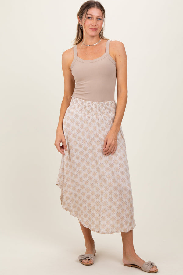 Beige damask print maternity midi skirt with smocked waistband, stylish and comfortable for expecting mothers.