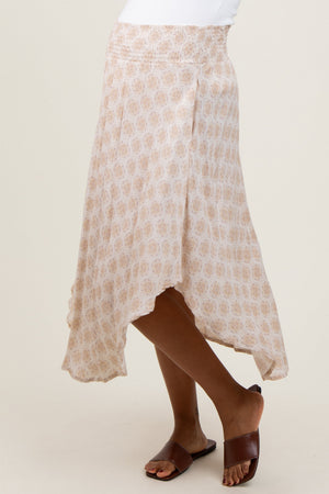 Beige damask print maternity midi skirt with smocked waistband, stylish and comfortable for expecting mothers.